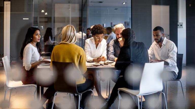 team of office workers having a meeting
